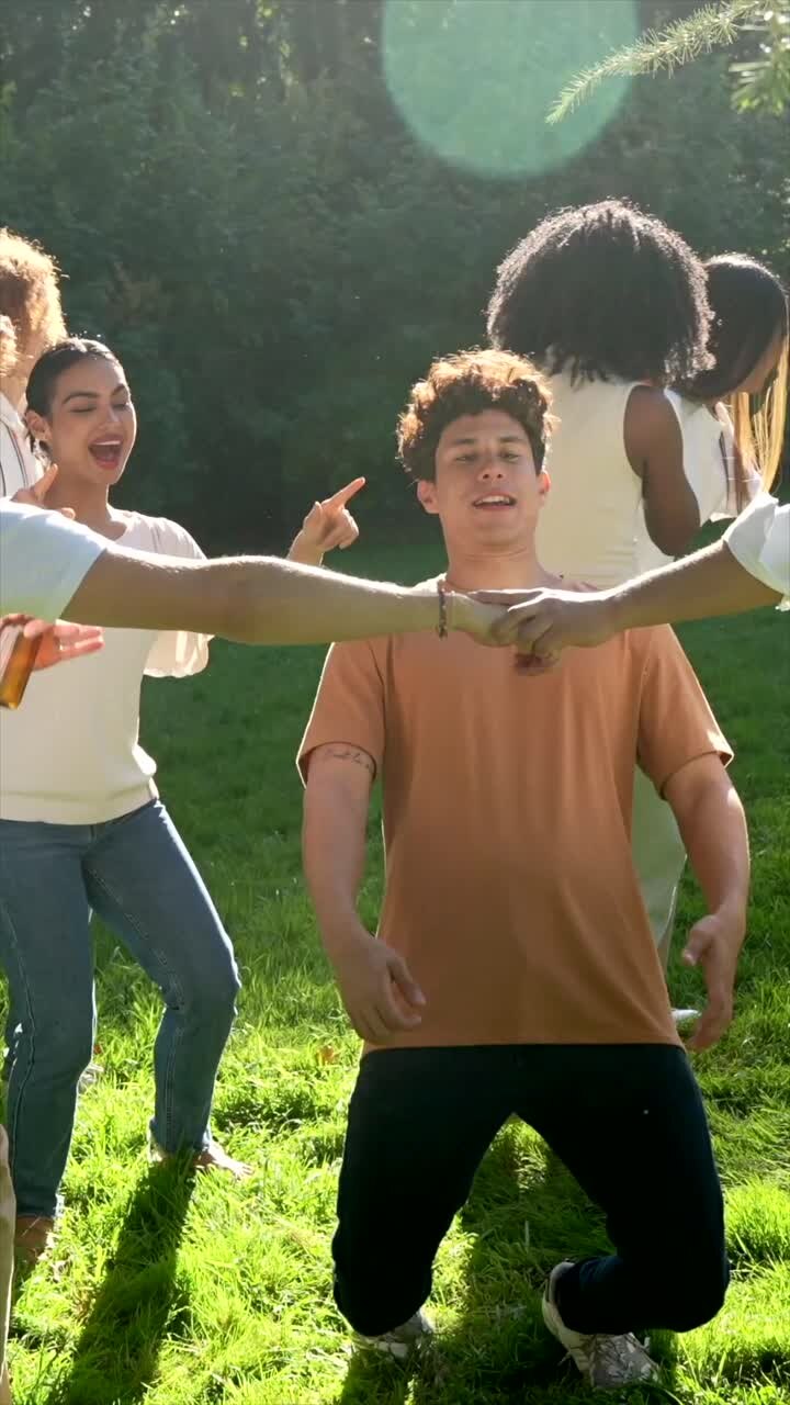 Group of People Playing a Game Outdoors