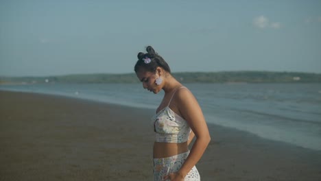 self-aware-girl-posing,-looking-into-camera,-beach-waves-in-background,-independent-girl,-self-conscious,-insecure,-poetic,-philosopher-gen-z-female-personality,-young-generation,-fashionable,-style