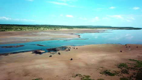 riders looking at the amazing view of lake magadi in kenya, east africa