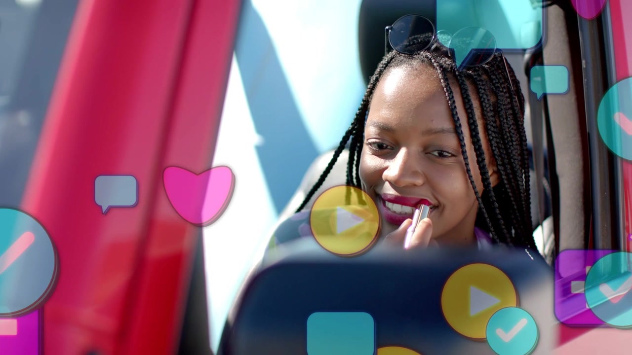 Vertical video: Woman in parked car applying lipstick, checking side mirror, social icons growing