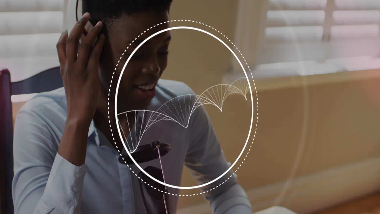 Technology podcaster speaking into microphone in studio, showing animated data viz circle