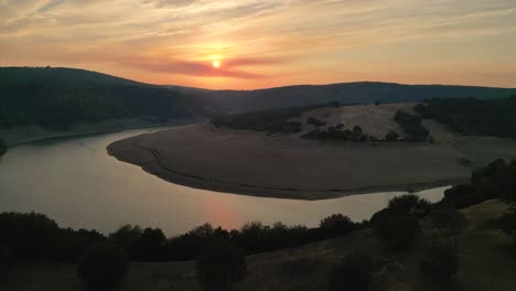 Aerial-View-Of-Rio-De-Aliste-During-Golden-Hour-Near-Castillo-De-Alba,-Losacino,-Zamora,-Spain