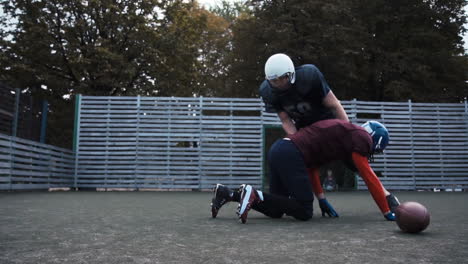 american football players in action and training