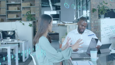 data processing on interface over diverse colleagues discussing at casual office meeting