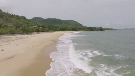 Fast-aerial-footage-of-waves-on-a-beach-in-Sierra-Leone-Africa