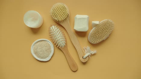 relaxing spa day essentials: body brushes, loofah, soap, and hairbrush