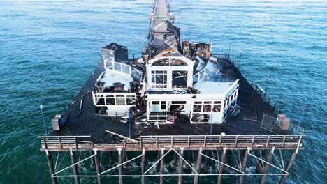 damage aftermath, oceanside pier burning