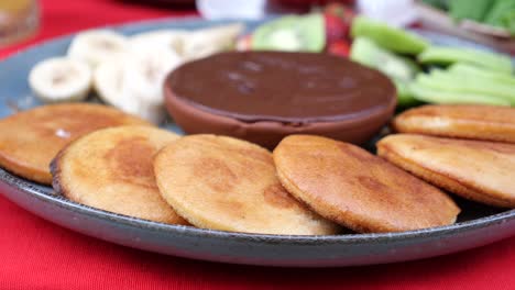 pancakes with chocolate spread and fruit