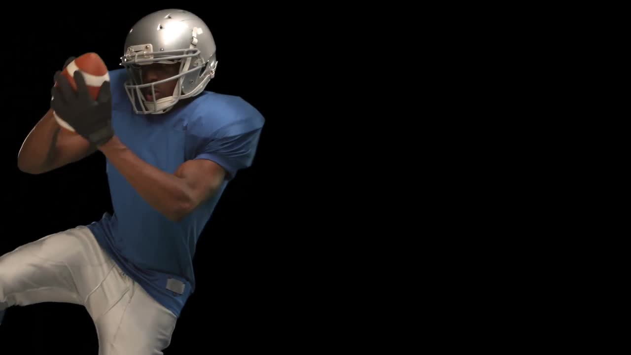 Palla cattura giocatore di football americano