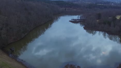 A-drone-flyover-of-a-levy-and-lake