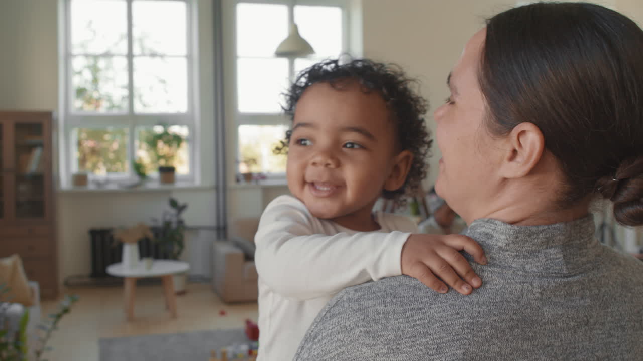 Slowmo of Mother and Toddler Boy at Home
