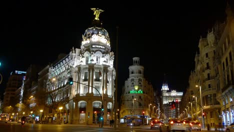 spain gran via madrid night light metropolis hotel building 4k