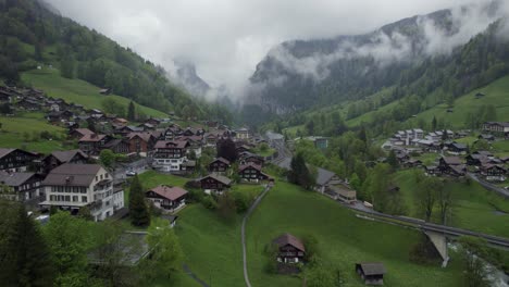 Switzerland-City-of-Lauterbrunnen-Town-in-Alp-Mountains,-Aerial-Landscape