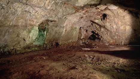 Inside-prehistoric-cave-gallery,-shot-with-a-drone