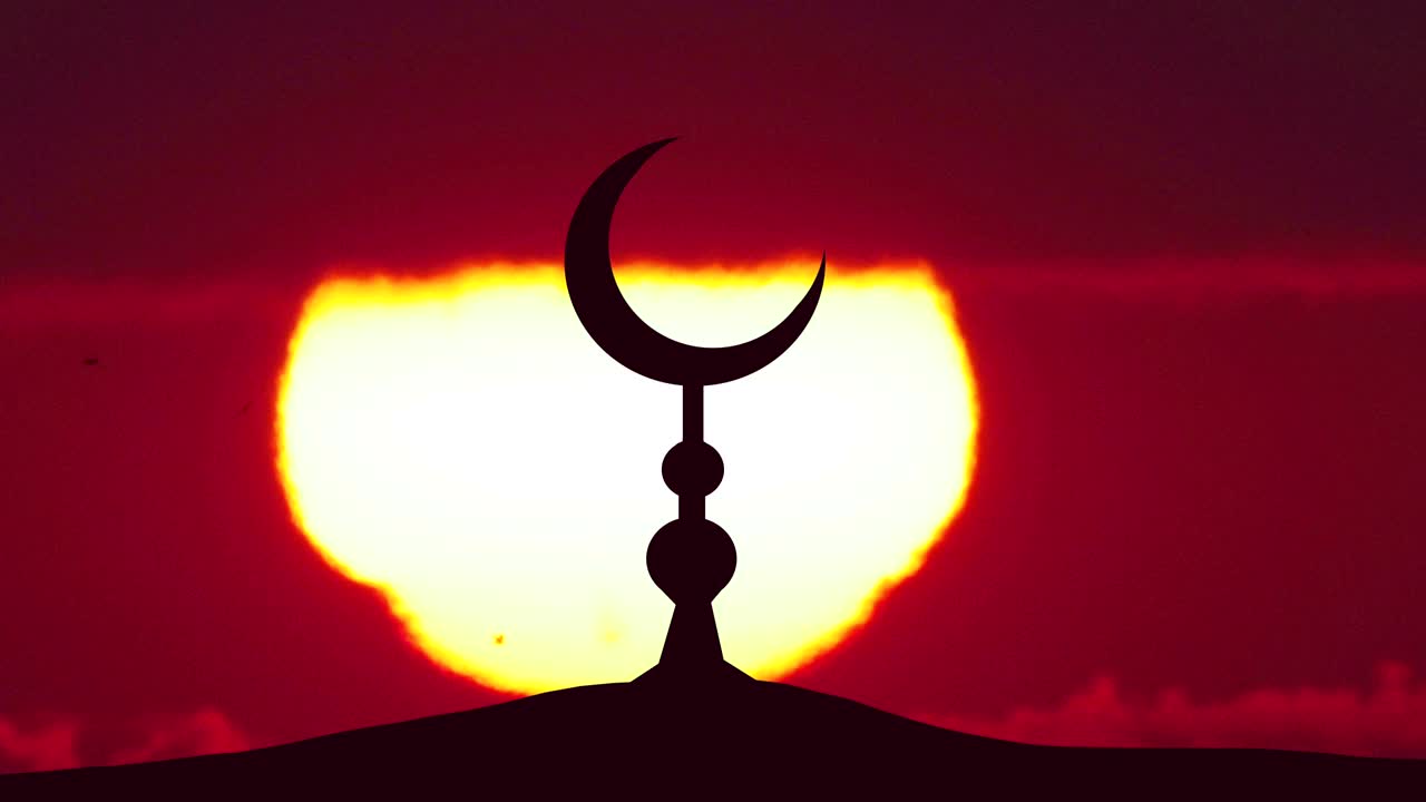 el símbolo del islam contra el fondo del sol. captura en tiempo real