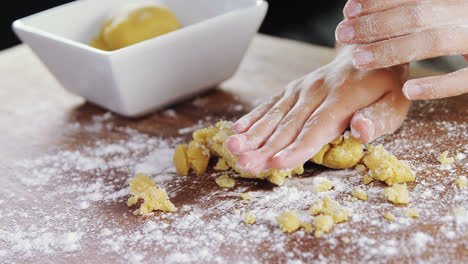 Woman-preparing-a-dough-ball-4k