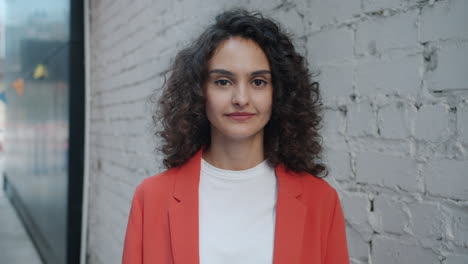 woman in red blazer portrait