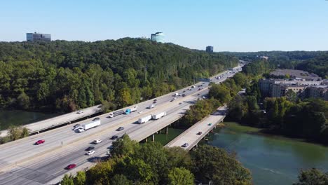 drone shot of interstate 285 and the chattahoochee river in vinings, georgia