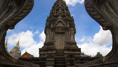 angkorian like temple structure in pagoda, with naga protector at entrance