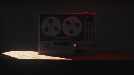 a vintage tape recorder spinning spools in a red blinking light