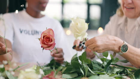 women creating floral arrangements