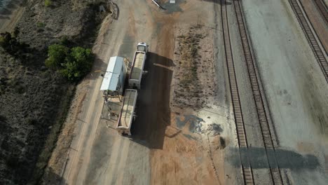 machinery taken sample of grain after harvest loaded in truck