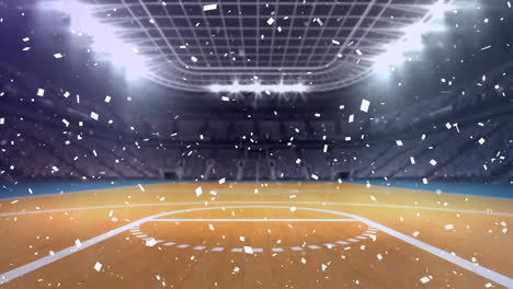 animation of falling confetti over light on roof of empty basketball court