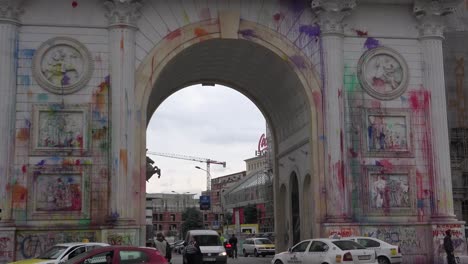 the arch in skopje represents rampant corruption to macedonians and they have thrown paint all over it in protest 1