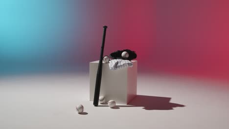 Studio-Baseball-Still-Life-With-Bat-Ball-Catchers-Mitt-And-Team-Jersey-With-Red-White-And-Blue-Lighting-3