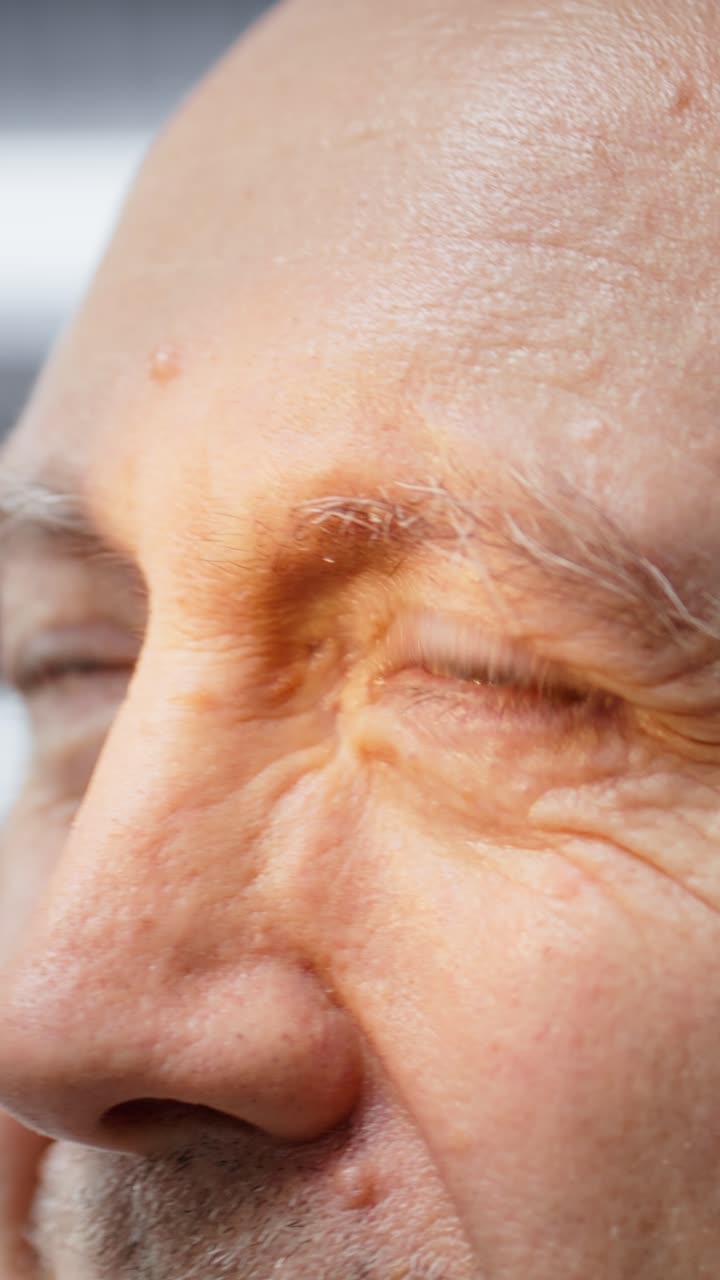 Vertical Video Black researcher conducting a medical study on a senior patient