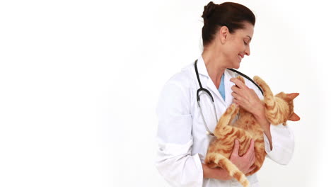 Smiling-veterinarian-with-a-cute-cat-in-her-arms