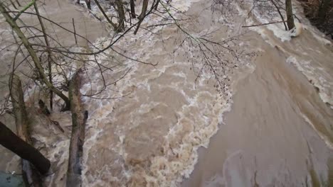 mass of water in a storm the raging river after extreme weather
