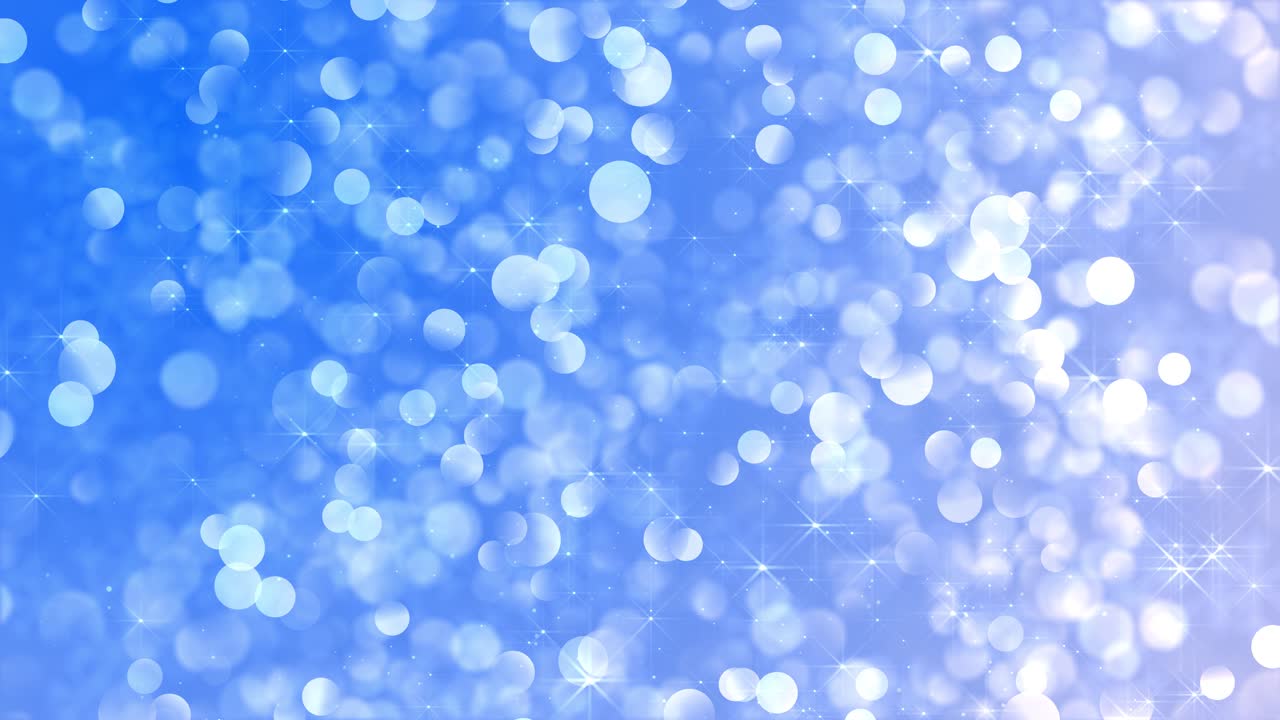 雪と瞬く星のクリスマス背景。ボケ粒子が光るクリスマスライトの背景。