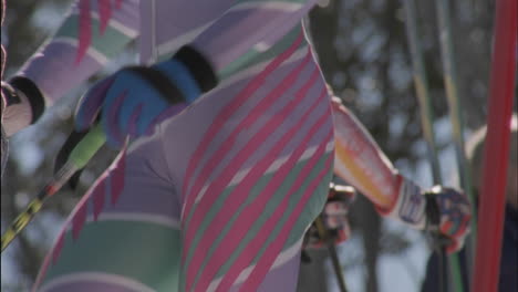 a skier stretches before skiing