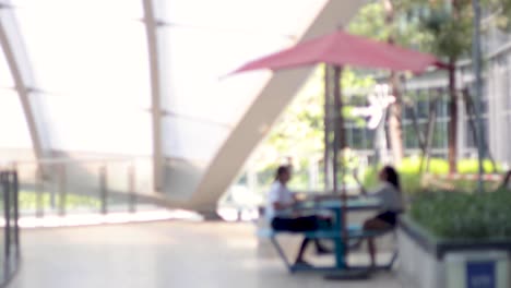 two people engaged in conversation outdoors