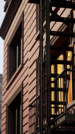 a fire escape on the side of a brick building in the city