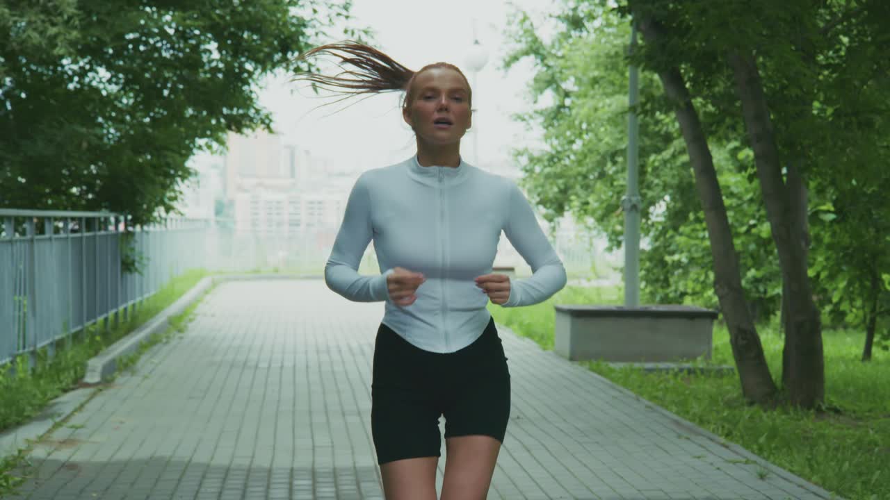 Woman running in park