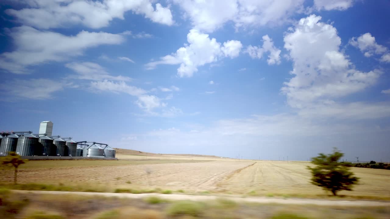 Agricultural Silos Under a Blue Sky