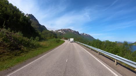 Vehicle-point-of-view-Driving-a-Car-VR-Caravan-travels-on-the-highway.-Tourism-vacation-and-traveling.-Beautiful-Nature-Norway-natural-landscape.