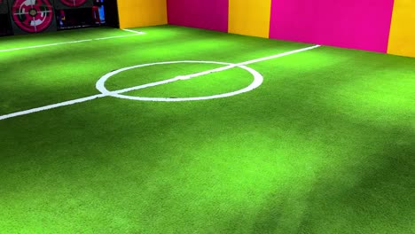 colorful indoor soccer field with green turf and white markings—great for sports, youth, training, or recreation themes