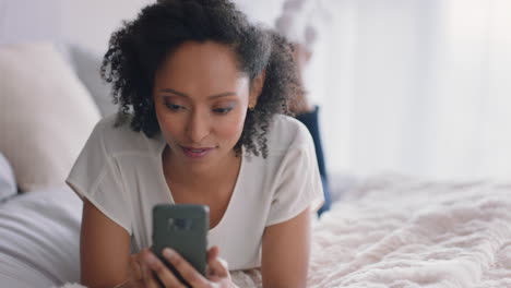 beautiful-woman-using-smartphone-texting-browsing-social-media-messages-enjoying-mobile-phone-communication-lying-on-bed-at-home