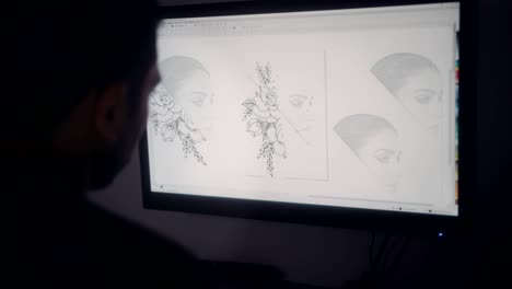 diseñador gráfico concentrado usando computadora y trabajando en dibujo