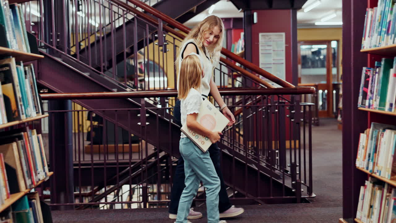 A mother and daughter in a library