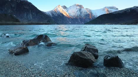 Wavy-crystal-clear-lake-Eikesdalsvatnet-in-Norway