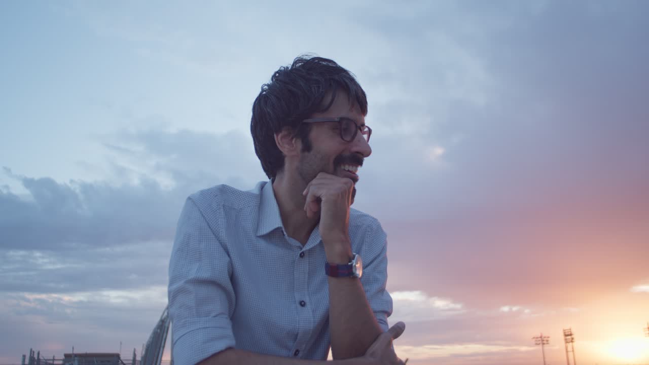 Man Contemplating at Sunset