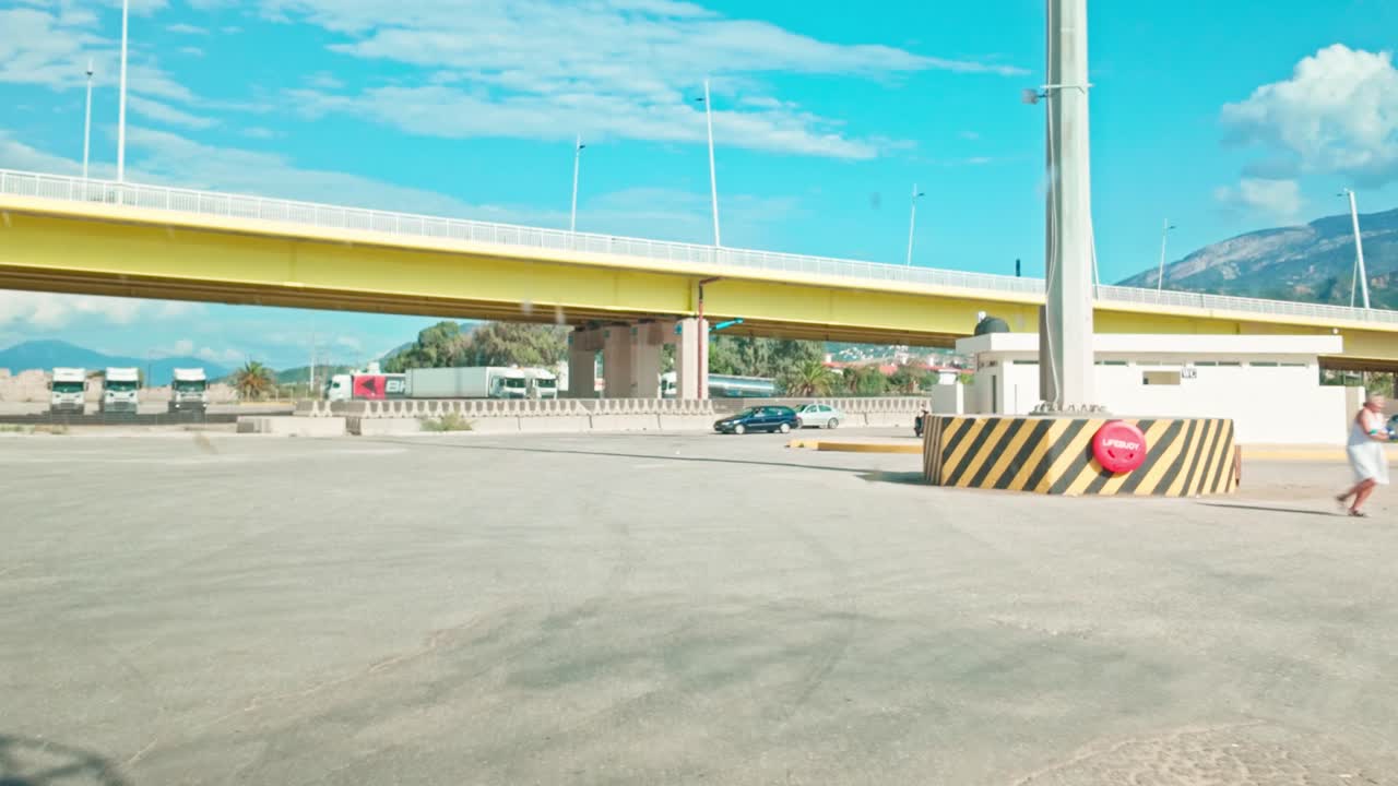 Vehicle disembarks Rio-Antirrio ferry boat Patras dock Pelopennese