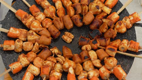 top view of suki satay on a hot pan in barbecue party