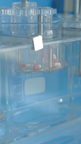 capsule being tested in a dissolution apparatus