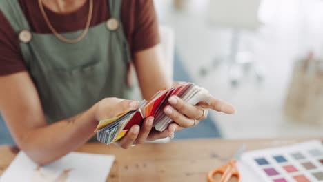 woman, hands and color swatches in small business