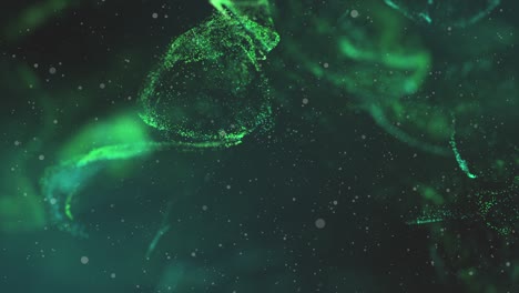 4k video of green glitter particles background with shining light flares.